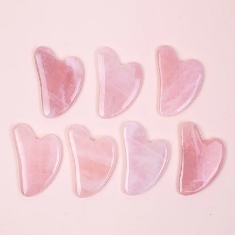 Herramienta de masaje facial Gua Sha de cuarzo rosa A+ de gran venta, cristal natural en forma de corazón, producto de belleza para el cuidado de la piel, reafirmante y tensor