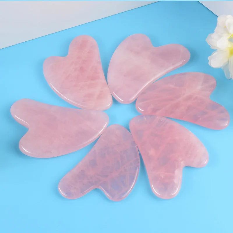 Herramienta de masaje facial Gua Sha de cuarzo rosa A+ de gran venta, cristal natural en forma de corazón, producto de belleza para el cuidado de la piel, reafirmante y tensor
